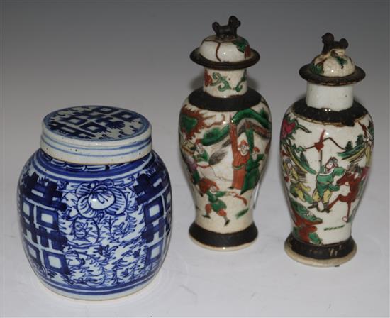 A pair of Chinese crackleglaze vases and covers & a blue and white jar